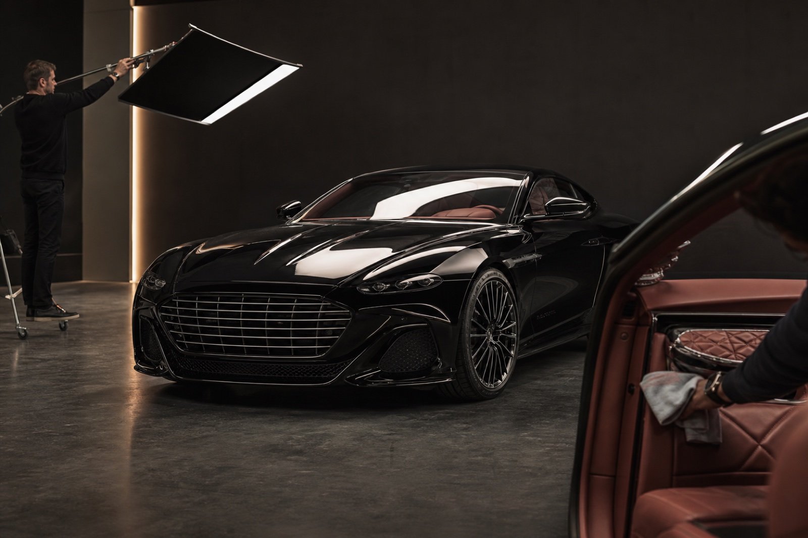 A luxury vehicle being prepared for professional presentation